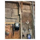 Old hay hook, old rotary dial phone, old padlocks