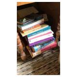 Stacks of books on server in upstairs bedroom