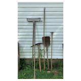 Long Handle Tools BESIDE THE GARAGE