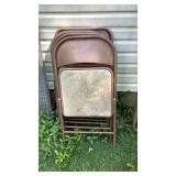 Metal Folding Chairs BESIDE THE GARAGE