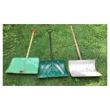 Snow Shovels BESIDE THE GARAGE