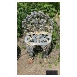 Wrought Iron Chair BETWEEN HOUSE AND GARAGE