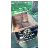 Wood crate, boots have hole