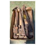 Crow bar and pipe wrenches