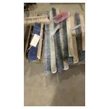 pallet of concrete brooms