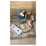 pallet of brackets, large bolts, and misc