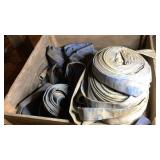 pallet box full of assortment of trash pump hose w