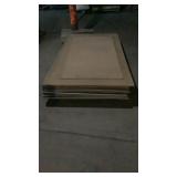pallet of Masonite sheets