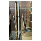 Misc piles of long handled items