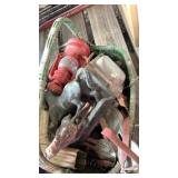 Basket of metal items, roller skates, horses,