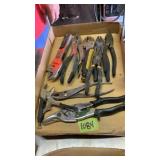 Pliers, adjustable wrench, snips, vice grips