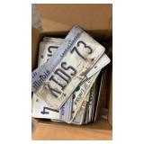 Box of license plates and flashing light