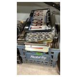 Milk crate of license plates