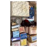 Box of Avon bottles and collectibles