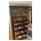 Large display cabinet, doors on both end open,