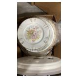 Clock, plates, platters, plumbing items