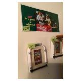 Wall decor including Coca-Cola sign