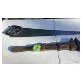 Hand saw and pipe wrench