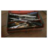 Metal tool box with assortment  of pliers and