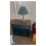 Cabinet With Marble Top and table Lamp