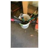 5 gal bucket with assortment  of scrapers and pry