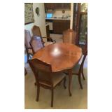 Wooden Dining room table, 6 chairs two are
