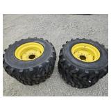 (4) New 12x16.5 skid loader tires on 6 bolt wheels