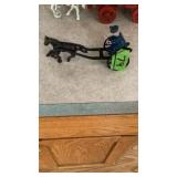 Cast Iron horse and man