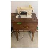 Singer sewing machine w/cabinet, assorted sewing