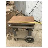HAMILTON PORTELEVATOR TABLE ON CASTERS,