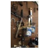 Items on Wall above Tool bench