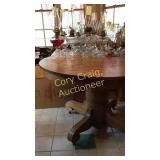 Round Oak Table. Does not include items on table