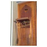 Wall hanger with old utensils