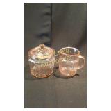 Pink Depression glass pitcher & cracker jar