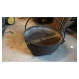 Black Cast Iron Pot , has hole in bottom