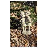 Concrete Statue. By back deck