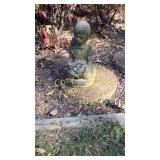 Concrete lawn statue