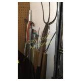 Items in corner west wall of garage by overhead