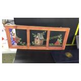 Window screen with strawberries and birdhouse