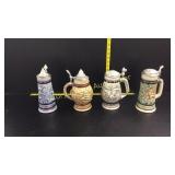 Four Avon Steins one has broken handle
