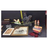 Assorted pictures, cookie cutters, prisms, bird