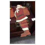 Two wooden Santas and Bunnies in basket