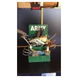 Assortment of tools and Army advertisement tray