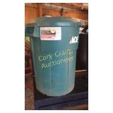 Two 32 gallon trash cans full of cover alls,