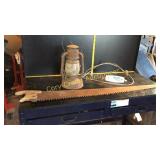 Electrified lantern , Old Saw and Thermometer