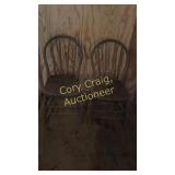 Two primitive chairs straight back