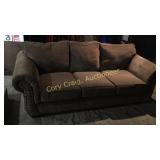 Cloth Brown Sofa has a burn hole on inside MUST