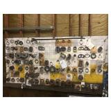 Board full of exhaust donuts, gaskets & more