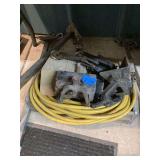 Assorted Metal Tools and Yellow Hose
