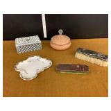 Assorted Vanity Items Including Glassware, Brush, and Case